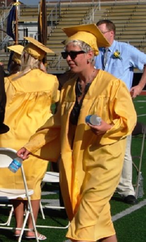 Erin Magoc grabs some water to beat the heat.