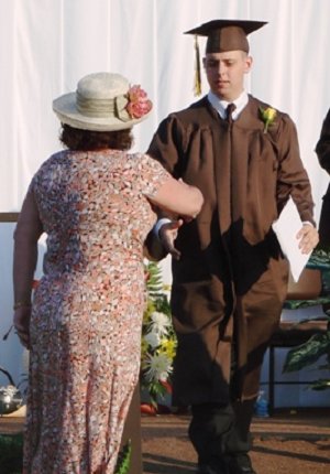 Zach Wolfe exits the stage after receiving his diploma.